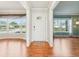 Bright entryway with hardwood floors and view to living room at 13214 Moran Dr, Tampa, FL 33618