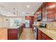 Modern kitchen with granite countertops and stainless steel appliances at 13214 Moran Dr, Tampa, FL 33618