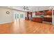 Open concept kitchen with dark wood cabinets and granite countertops at 13214 Moran Dr, Tampa, FL 33618