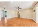 Bright living room with hardwood floors and a ceiling fan at 13214 Moran Dr, Tampa, FL 33618