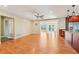 Spacious living area with hardwood floors and access to the kitchen at 13214 Moran Dr, Tampa, FL 33618