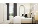 Cozy bedroom with a white bed, dark gray curtains, and a full-length mirror at 15233 Rainbow Quartz St, Wimauma, FL 33598