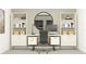 Functional home office with a desk, built-in shelves, and comfortable chair at 15233 Rainbow Quartz St, Wimauma, FL 33598