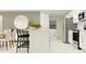 Modern kitchen with island, stainless steel appliances, and breakfast bar at 15233 Rainbow Quartz St, Wimauma, FL 33598