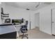 Home office with built-in shelving and dual monitors at 1742 Mississippi Ne Ave, St Petersburg, FL 33703