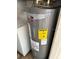 Laundry area with Rheem Performance water heater at 21480 Olean Blvd, Port Charlotte, FL 33952