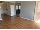 Bright living room with laminate wood flooring and an open floorplan at 21480 Olean Blvd, Port Charlotte, FL 33952
