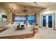 Open living room with water view, multiple couches, and lots of light at 26 Sunset Bay Drive, Belleair, FL 33756