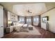 Relaxing main bedroom with water view, TV, and neutral tones at 26 Sunset Bay Drive, Belleair, FL 33756