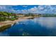 Aerial view showcasing waterfront community and boats at 2700 Bayshore Blvd # 11302, Dunedin, FL 34698