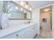 Modern bathroom with a large vanity and walk-in shower at 2700 Bayshore Blvd # 11302, Dunedin, FL 34698