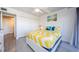 Bright bedroom with a queen bed and ample closet space at 2700 Bayshore Blvd # 11302, Dunedin, FL 34698