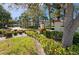 Landscaped entrance to Mediterranean Manors community at 2700 Bayshore Blvd # 11302, Dunedin, FL 34698