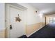 Condo hallway with carpeted floor and neutral walls at 2700 Bayshore Blvd # 11302, Dunedin, FL 34698