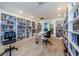 Community library with numerous books and work area at 2700 Bayshore Blvd # 11302, Dunedin, FL 34698