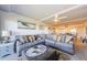 Open living space featuring sectional sofa and access to dining area at 2700 Bayshore Blvd # 11302, Dunedin, FL 34698