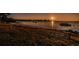 Scenic waterfront property with sunset view, boats, and bench at 2700 Bayshore Blvd # 11302, Dunedin, FL 34698