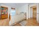 Cozy bedroom featuring a double bed and built-in shelving at 2700 Bayshore Blvd # 4309, Dunedin, FL 34698