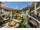 Condo community courtyard with fountain and landscaping at 2700 Bayshore Blvd # 4309, Dunedin, FL 34698