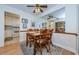 Cozy dining area with a wood table and chairs, kitchen access at 2700 Bayshore Blvd # 4309, Dunedin, FL 34698