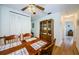 Bright dining area with wood table and chairs near kitchen at 2700 Bayshore Blvd # 4309, Dunedin, FL 34698