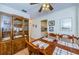 Dining room showcasing a wood table, chairs, and built-in hutch at 2700 Bayshore Blvd # 4309, Dunedin, FL 34698
