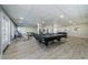 Community game room with pool table and fitness equipment at 2700 Bayshore Blvd # 4309, Dunedin, FL 34698