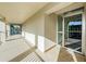 Lighted condo hallway with access to upper floor at 2700 Bayshore Blvd # 4309, Dunedin, FL 34698