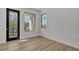 Bright bedroom with wood-look floors and private door at 3175 10Th N Ave, St Petersburg, FL 33713