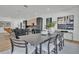 Modern dining room with dark wood table and seating at 3175 10Th N Ave, St Petersburg, FL 33713