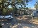 Spacious backyard featuring concrete patio and partial chain link fence at 3416 N 48Th St, Tampa, FL 33605
