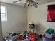 Modest bedroom with a ceiling fan and natural light, ready for a makeover at 3416 N 48Th St, Tampa, FL 33605
