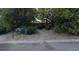 Charming single-story home featuring mature trees and a spacious front yard at 3416 N 48Th St, Tampa, FL 33605