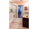 Main bathroom with walk-in shower and double vanity at 3653 Kings Rd # 101, Palm Harbor, FL 34685
