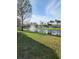Peaceful community view with a pond, fountain, and lush landscaping at 3653 Kings Rd # 101, Palm Harbor, FL 34685