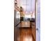 Modern kitchen features stainless steel appliances and wood flooring at 3653 Kings Rd # 101, Palm Harbor, FL 34685