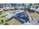 Community overview featuring pool, shuffleboard, and homes at 37347 Derbyshire Dr, Zephyrhills, FL 33542