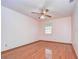 Empty bedroom with hardwood floors and ceiling fan at 37347 Derbyshire Dr, Zephyrhills, FL 33542