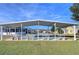 Enjoy a game of shuffleboard under covered courts at 37347 Derbyshire Dr, Zephyrhills, FL 33542