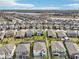 Aerial view of houses and community at 4062 Cadence Loop, Land O Lakes, FL 34638