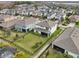 Aerial view of a house with backyard at 4062 Cadence Loop, Land O Lakes, FL 34638