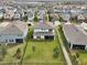 Aerial view of a house with backyard at 4062 Cadence Loop, Land O Lakes, FL 34638