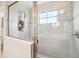 Modern bathroom with a large shower and tile surround at 4062 Cadence Loop, Land O Lakes, FL 34638