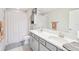 Modern bathroom with double vanity and a shower/tub combo at 4062 Cadence Loop, Land O Lakes, FL 34638
