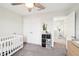 Bedroom with crib, dresser, and plenty of closet space at 4062 Cadence Loop, Land O Lakes, FL 34638
