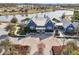 Community clubhouse with lake view and seating at 4062 Cadence Loop, Land O Lakes, FL 34638