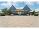 Community clubhouse with a large front porch at 4062 Cadence Loop, Land O Lakes, FL 34638