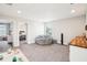 loft with beanbag chair, desk area, and view into bedroom at 4062 Cadence Loop, Land O Lakes, FL 34638