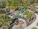 Community playground with play structures and fire pit at 4062 Cadence Loop, Land O Lakes, FL 34638