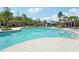 Resort-style community pool with expansive deck at 4062 Cadence Loop, Land O Lakes, FL 34638